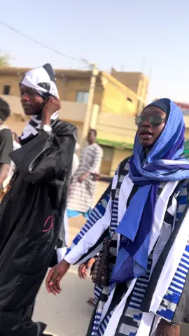 A post by @ndeyendigueulfall on TikTok caption: ##yayefallndigueulélémentbayam @BeLeL Hijaab 🧕🏽 @Ndém création 🩵🖤🩵🖤🩵🖤 @AsSalihou Photographe778914880 @Teranga pro❤️🫀 @Le prince bayou goor🖤🤍 