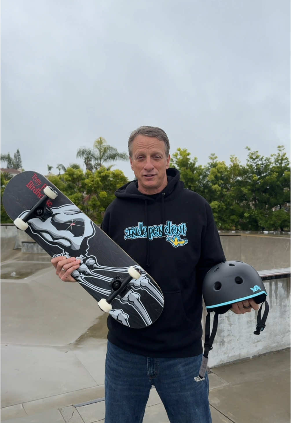 A post by @tonyhawk on TikTok caption: #stitch with @✨Thriftcore & More✨ Helping a new skater get a head start with @Birdhouse Skateboards & @Yepa Brand helmet