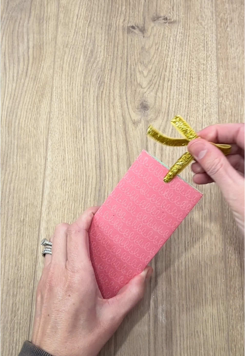 A post by @beeandblooms on TikTok caption: Another fun way to wrap up gift cards! Don’t forget to follow me on IG @beeandblooms 🥰 #beeandbloomswraps #wrappinggifts #giftwrapping 
