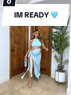 A post by @lianev on TikTok caption: I’m ready! 🩵 #fashion #pregnant #mom 