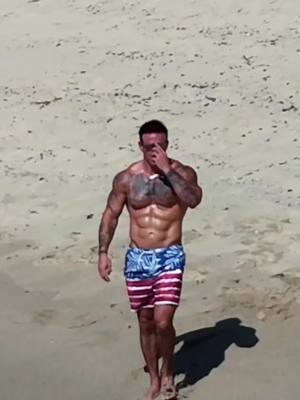 A post by @nottattedfire on TikTok caption: Feeling this #cowboy #muscle #tattoos #BookTok #beach #beachvibes 