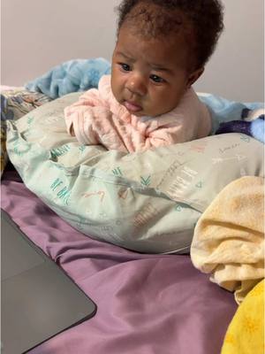 A post by @reniyaalashee on TikTok caption: She literally will sit like this and watch bluey the whole time 😭😭#firsttimemom #prettybaby #gerberbaby 