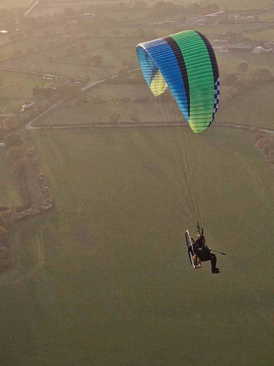 A post by @jacko_oo on TikTok caption: Flying with all the gear and no idea. Powered by ADHD, Wind & Sugar. #adhdtiktok #adhdmademedoit #paramotor #ppg #flying #reviews