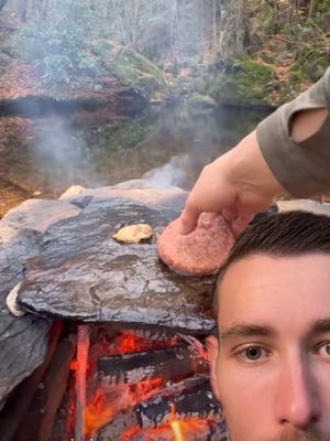 A post by @itsmenicksmithy2 on TikTok caption: @KARADENİZLİ MACERACI cutting meat by the river 😍 #satisfying #nature #fyp 
