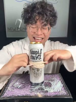 A post by @liquiddeath on TikTok caption: Renowned rubber band expert Soy Arlo put our infinitely recyclable can of premium Liquid Death Mountain Water through a strength test to ensure it could withstand the day to day occurrence of 6,523 rubber bands. // Repost from @Soy Arlo_ // #liquiddeath #murderyourthirst #deathtoplastic