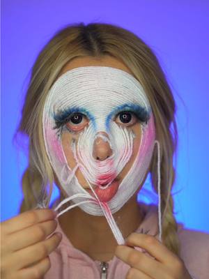 A post by @noeminikita on TikTok caption: asmr yarn makeup removal 💄 #yarnmakeup #woolskin #makeup #fyp #beauty #asmr #creativemakeup #MakeUpArtist #foryoupage #garnmakeup  
