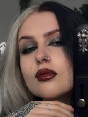 A post by @izzysiim on TikTok caption: Gun metal grunge makeup 🖤⛓️  Eyeshadow palette @BEAUTY BAY  Lipliner @KIKO Milano  Lip gloss @nyxcosmetics_uk 