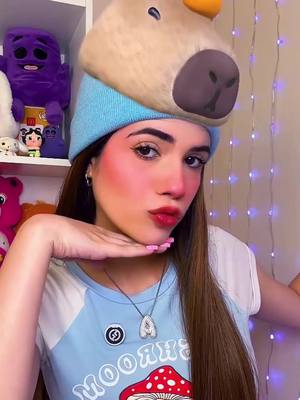 A post by @soyanicat on TikTok caption: Probando filtros RAROS de Capibara🤎🤣