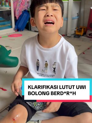 A post by @louissescarlettfamily on TikTok caption: Klarifikasi uwi Lutut bolong BerD*R*H @Louissescarlettkids @LouissescarlettPapi #LouisseScarlettFamily #LouisseScarlett #Fyp #Goviral #MamiGlowingIndonesia #LoewyAxell #PapiGlowingIndonesia #PapiLouisseScarlett #PapiJulidIndonesia 