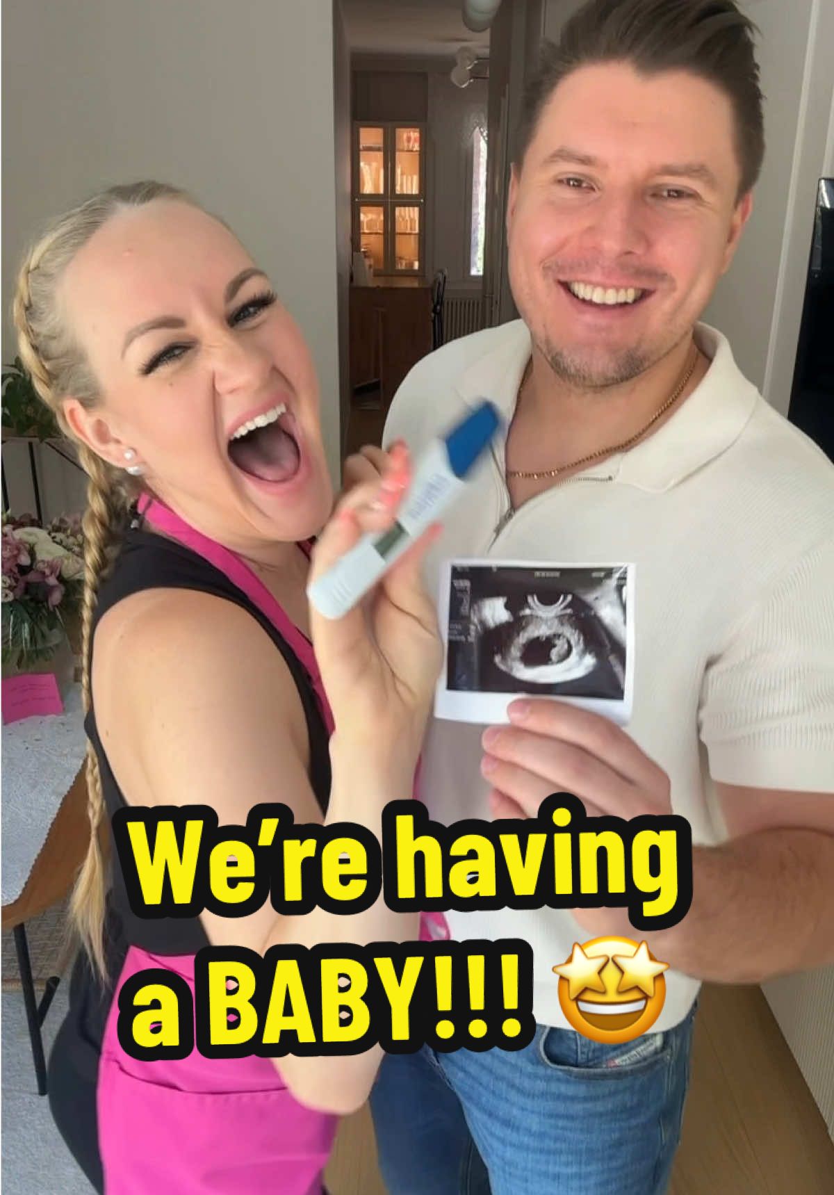 A post by @aurikatariina on TikTok caption: I’m so excited for double the laundry!!!!! 🤭 #pregnant #pregnancy #pregnancyannouncement 