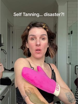 A post by @shenaegrimesbeech on TikTok caption: Apart from the streak on my cheek and bug in my shirt, I call this a success! 🤣  #selftan #selftanner #faketan #beautyreview 