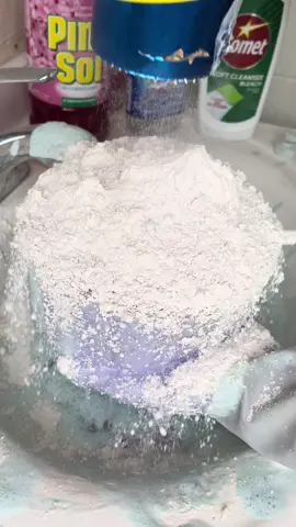 A post by @cleaningleo on TikTok caption: i just love powder idk. 4 cans of lemon comet & 4 cans of ajax 🤤 this combo was deliciousss, texture and smell😩 #sinkclean #asmrsounds #spongesqueezing #fypシ 