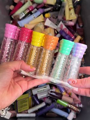 A post by @luckygirlscoops on TikTok caption: Restock Our Lucky Lipgloss Scoop With Me Part 2 💕 • • • #lipgloss #cosmetics #asmr #asmrsounds #lipglossaddict #lipcare #ilovelipgloss