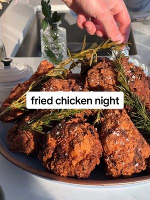 A post by @ryannordheimer on TikTok caption: fried chicken dinner party 🍗   recipes below :) and make sure to follow me so you don’t miss out on more dinner parties buttermilk ranch biscuits 🌿 1. Add 3.5 cups all purpose flour, 2 tbsp sugar, 1 tbsp + 1 tsp baking powder, 1/2 tsp baking soda, 1.5 tsp kosher salt, 1-2 tbsp ranch seasoning, 3 sliced scallions. Whisk. Then drop in 2 sticks @tillamook butter chilled, sliced unsalted butter. Toss. Then smash into the flour until butter pieces are the size of hazelnuts.  2. Drizzle in 1 1/4 cup buttermilk. Turn dough out. Press into a square. Divide into quarters, stack, and press down. Repeat again. Transfer to plastic wrap, press to 1” thick, and chill for 1 hour.  3. Divide into 9 pieces. Transfer to baking sheet. Brush tops with heavy cream. Bake at 400F for 25 minutes.  buttermilk fried chicken with habanero hot honey 🍗 1. Add 2 cups buttermilk, 2 tbsp @zabs hot sauce, 6 rosemary sprigs, 4 tsp kosher salt to a large bowl and whisk. Add in 4 lbs. bone-in, skin-on chicken breasts, thighs, and/or drumsticks. Refrigerate overnight.  2. Add 3 cups flour, 1/4 cup cornstarch, 1 tsp salt, and whatever spices you like to a bowl and stir together. Toss in a few tbsp of the brine into the flour and mix around to create clumps. Then one piece at a time transfer chicken into the bowl and pack on the dredge.  3. Fry chicken in 350F oil 4-5 pieces at a time, until chicken is golden and registers 160F degrees. Season with flaky salt. Fry the rosemary too if you’d like.  4. Simmer 1 cup honey with 2 sliced habanero, 1 tbsp water for a couple minutes to infuse. Then serve w chicken.  classic pickles 🥒 1. Bring 2 cups of @heinz white vinegar, 2 cups water, 2 tbsp kosher salt to a simmer, 4 @mortonbassettspices bay leaves, 4 garlic cloves. Pour over Persian cucumbers packed into quart containers. Refrigerate one day.  . . . #ryannordheimer #recipe #viral #biscuits #chicken #southernfood #privatechef #aesthetic #comfort #cookbook #comfortfood #ranch #easydinneridea #nyc #newyork #bread #breadrecipe #carbs #nycfoodie #nycfoodblogger #nycfood #creator #dinnerparty #pickle #pickles #leeks #spring #springrecipe #icecream #flowers

