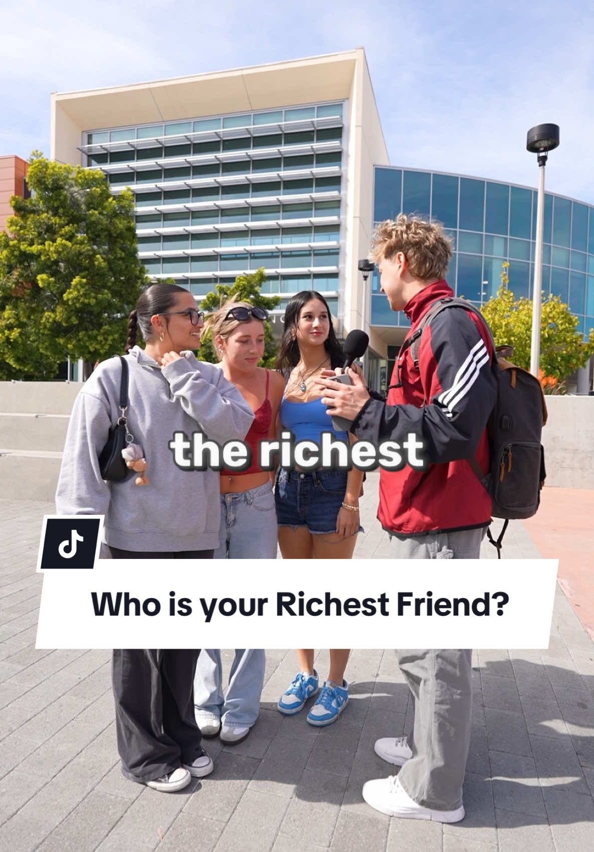 A post by @johnrusanov on TikTok caption: Who is the richest person you have in your contacts? #manonthestreet #interview 