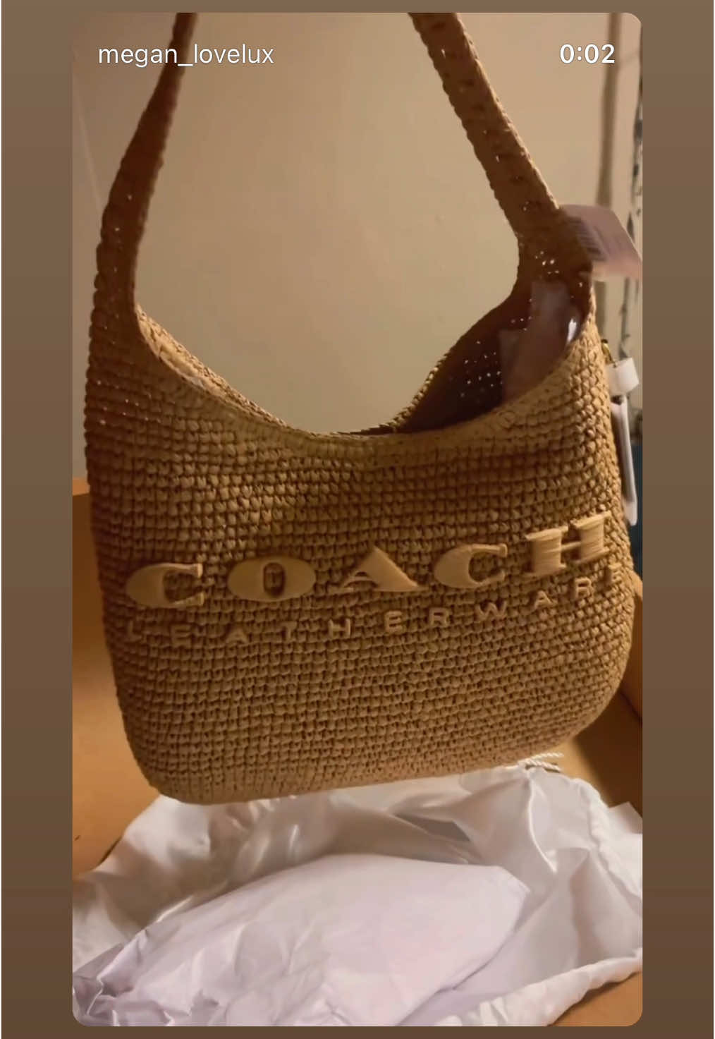 A post by @ on TikTok caption: Just in time for the summer ☀️ #coachbrooklynbag #coachbrooklyn28 #coachstrawbag #coachbrooklynshoulderbag #coach #somenew #newdrop #fyp #summerbag 