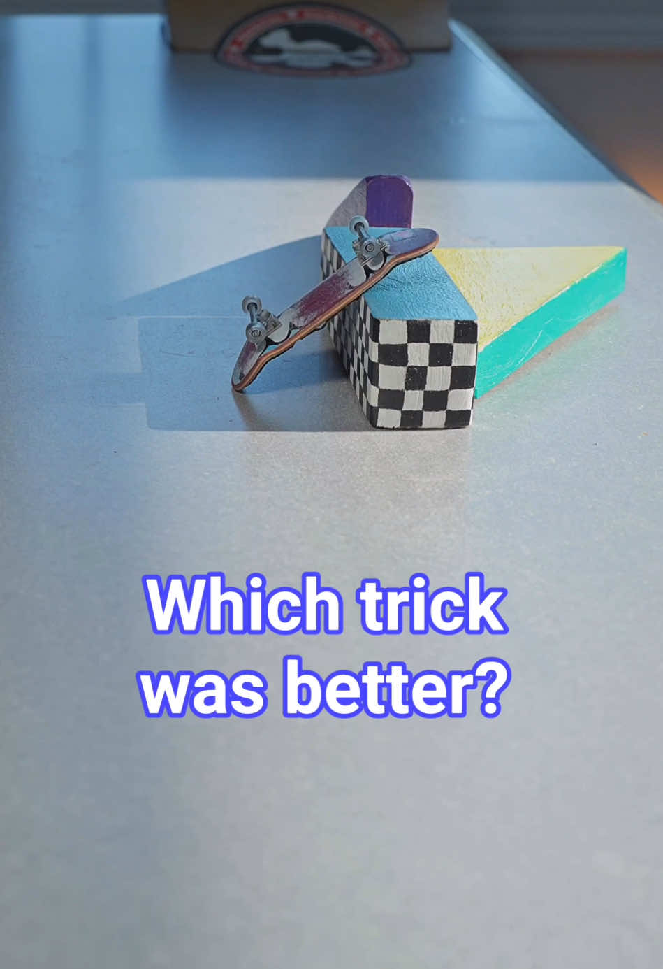 A post by @stonedboarder on TikTok caption: 1 or 2? 💭 #fingerboarding #fingerskate #fingerboarder #skatelife #fingerboard #diy #skatespot #profingerboard #techdeck #skatetricks 