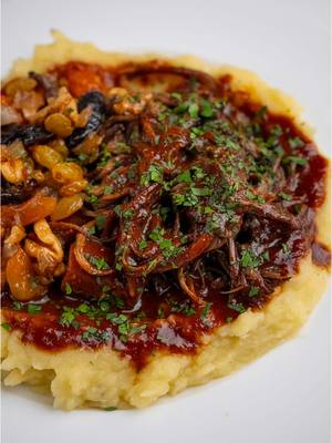 A post by @breadbakebeyond on TikTok caption: Braised Holiday Brisket Passover is just around the corner, and it’s one of my favorite holidays, it marks the start of spring and usually lands near my birthday, which makes it feel extra special. This slow-braised brisket brings back memories of family gatherings, good wine, and lots of laughter. The dried fruits are a traditional holiday staple from my mom, and the garlic confit mashed potatoes just felt like the perfect touch. Basically, this is my childhood on a plate (with a little twist). Wishing you a Happy Passover and Chag Sameach! #easydinner #easyrecipe #passover #kosher #easydinnerideas #holiday #braisedbeef #brisket  Easy recipes Slow cooked beef recipe Brisket recipes  How to make mashed potatoes  Passover recipes Braised brisket 