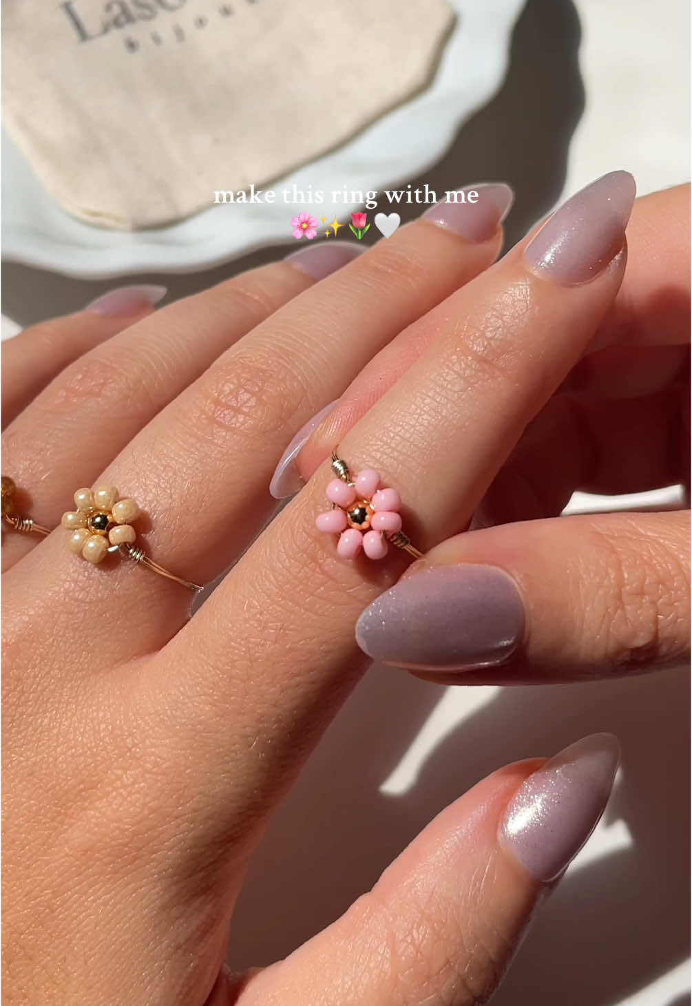 A post by @bijouxlasotita on TikTok caption: Make this ring with me🌸 Available on our website Bijouxlasotita.com ✨ #SmallBusiness #handmadejewelry #handmadejewelrybusiness #beadedjewelry #canadiansmallbusiness #handmaderings 