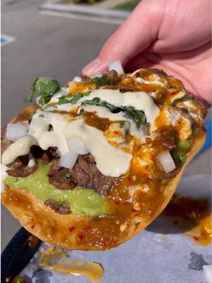 A post by @grubspot on TikTok caption: Tostadas @taconazo (secret menu) #grubspot #carneasada #alpastor #guacamole #salsa #foodtiktok #fyp 