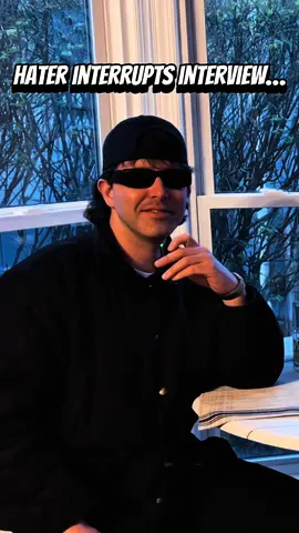 A post by @realwillgardner on TikTok caption: Hater interrupts interview…#haters #streetinterview #outtakes #motivation 