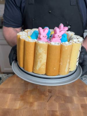 A post by @fooddudescook on TikTok caption: Easter peeps cheesecake #dessert #Recipe #homecooking 