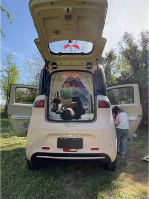 A post by @ellaonwheels_0 on TikTok caption: As long as you are with your family, you will be very happy.😁 #minicar #tricycle #campinglife #limousine #electriccar #Outdoor #fyp #relax #Happy 