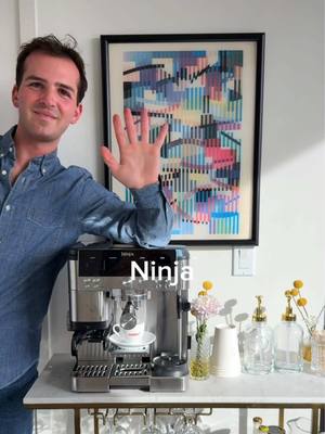 A post by @ryannordheimer on TikTok caption: turning my apartment into a café ☕️  #NinjaPartner it’s spring and my coffee bar is in need of a much-needed refresh. So enter the @Ninja Kitchen Luxe Café. A 3 in 1 coffee, espresso, and cold brew maker for literally the same price as my old machine (bye bye). it also has a built in grinder, two storage compartments, and about 20 options for adjusting for your ultimate brew. It looks great next to my grandparents’ hand-me-down vintage print and my new syrup dispensers too ✨     lavender latte recipe 🌸   1. Brew a double shot espresso in your Ninja Luxe Café.   2. Pump in 1-2 tsp lavender simple syrup.   3. Froth 6 oz milk then pour over the espresso.   4. Pipe store-bought marshmallow spread along the rim and carefully toast. Garnish with edible flower petals.    .   #recipe #viral #apartmentcafe #cafe #aesthetic #coffee #lavenderlatte #latte #latterecipe #nyc #newyork #nycfoodie #nycfoodblogger #nycfood #ryannordheimer