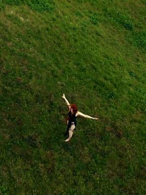 A post by @pattygurdy on TikTok caption: ⚔️ Share your story! Rise Up is about the bravery and freedom of reinventing yourself. Sometimes old versions of us just don't serve us anymore. Let's embrace our scars and start anew - together! 🙏 Has this happened to you? I love to hear your stories 💚- share below! #pattygurdy #riseup #tavernalbum #hurdygurdy #folk #fantasy #medieval