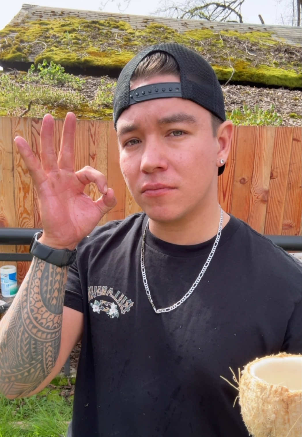 A post by @jonnytsunami808 on TikTok caption: How to open a coconut 🥥 