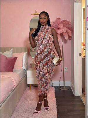 A post by @caittheegreat__ on TikTok caption: Got plans for date night, brunch, or a girls night out? 🤭Say less! This sexy, colorful fringe backless dress is the moment🩷 It hugs in all the right places with a super stretchy fit and pairs perfectly with heels in just about any color. You’re gonna turn head sis😍✨ • Outfit in my LTK Shop, linked in bio 🩷