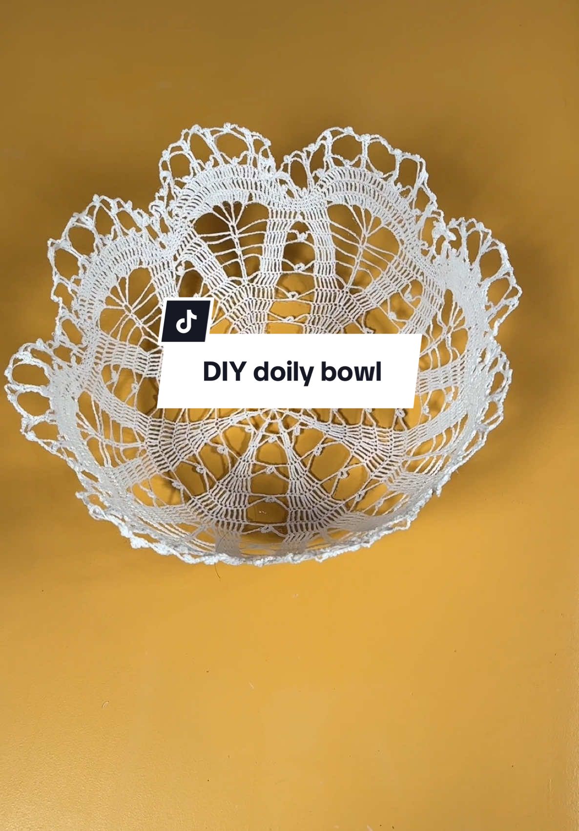 A post by @emilyrayna on TikTok caption: Another super easy home decor idea using a doily! #diyhomedecor #easydiy #diyproject #budgetfriendly #doily 