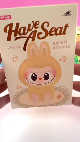 A post by @dottiestoys on TikTok caption: Unboxing Have a Seat Labubu!! #labubu #labubuthemonsters #labubuhaveaseat #labubuunboxing 