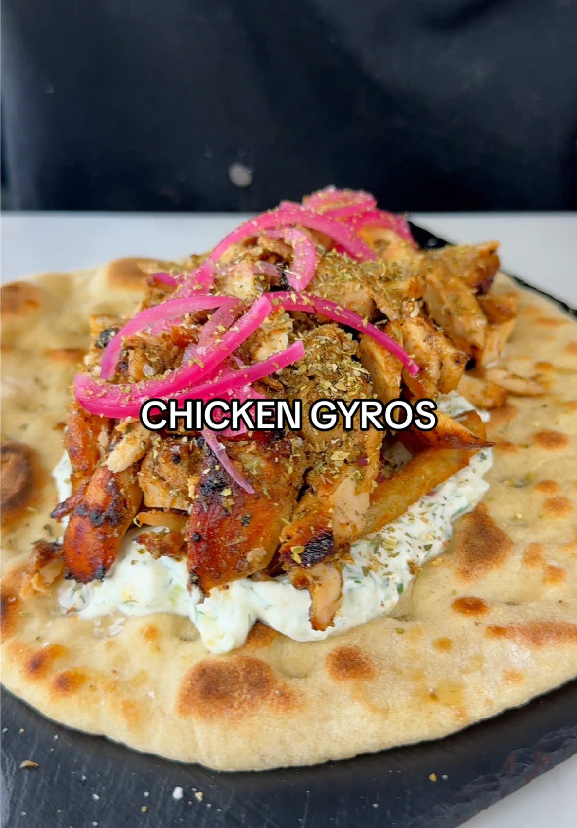 A post by @samseats on TikTok caption: Chicken Gyros 🥙 A few weeks back I hosted a supper club with @loveholidays for their Taste of Travel event in London. Since then, they challenged me to recreate a dish from a destination I love. If you've followed me for a while,  you’ll know that I spend a lot of time in Greece. What do I eat when I’m there? Gyros… LOTS of gyros 🔥 Click the link in bio for the full recipe! Use the code LETSDOSOMEBOOKING to get £100 off of your next holiday over £1000 with loveholidays 🇬🇷  #ThePowerOfLoveholidays #loveholidays #Letsdosomebooking #AD #chicken #gyros #greece 