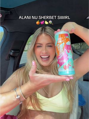 A post by @whitneyysimmons on TikTok caption: SHERBET SQUIRRRRREL 🍊💞🍦🍋‍🟩🍭 @Alani Nutrition taste test #sherbetswirl #alaninuenergy #alaninuenergy #alaninu #energydrink #tastetest 