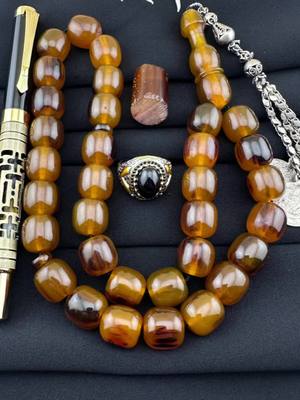 A post by @tasty_bite818 on TikTok caption: German Sandalus Misbah rosary #amber #sibha #tesbih #jewelry #faturan 