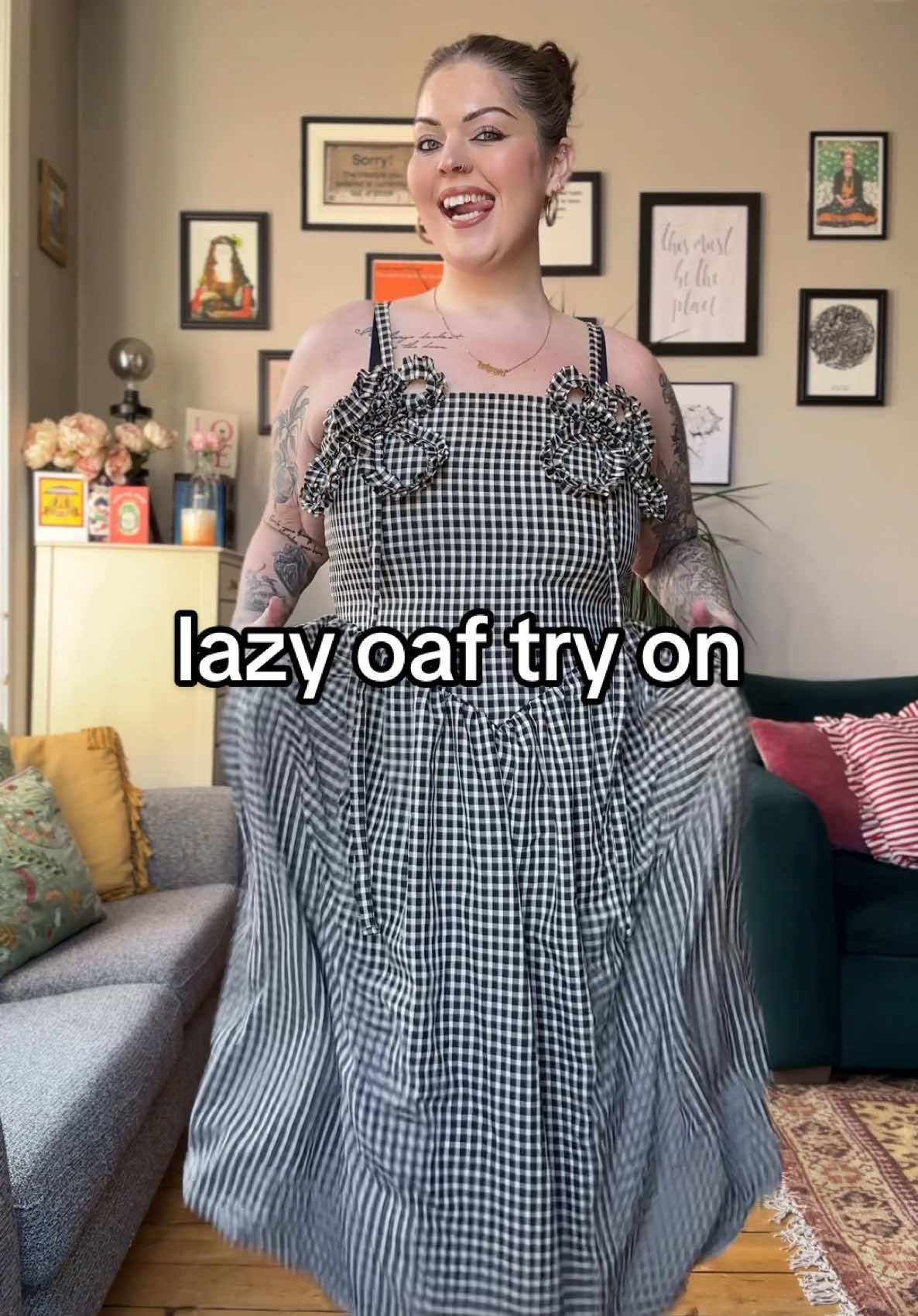 A post by @poppyadams92 on TikTok caption: a haul of monochrome DELIGHTS from @Lazy Oaf ✨ #plussizegrwm #lazyoaf #lazyoafdress #plussizehaul #tryonhaul #plussizetryon #plussizestyle #plussizesummer 