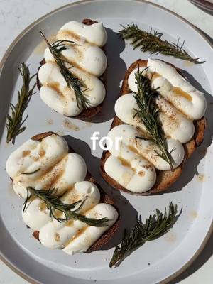 A post by @ryannordheimer on TikTok caption: spring brunch 🌸 spring is in the air but im not about to drop $50 on 2 eggs and a side of toast at a brunch. so we’re making spring brunch at home with @Shipt  With Shipt you can get all your favorite stores delivered right to your door like Target, CVS, Walgreens, and more within HOURS. Like I’m talking 2 hours ✨ use code RYAN10 for $10 off your next order of $35 or more #ShiptPartner recipes (with ingredients all available with Shipt) 🛒 whipped ricotta toast with rosemary brown butter 🍞 1. Brown one stick of butter. Toss in 4 rosemary springs and let cool.  2. Toast a few pieces of sourdough.  3. In a food processor, add 15 oz. Ricotta, 3 tbsp cream. Process for 1 minute. Transfer to a piping bag. Pipe squiggles onto the toast. And then drizzle on the brown butter. spring fruit salad 🍓 1. Add sliced grapefruit, kiwis, and strawberries to a bowl.  2. In a small bowl, mix 1/4 cup olive oil, 2 tbsp honey, 2 tsp chopped thyme. Drizzle over the fruit. Garnish with flaky salt.  eggless buttermilk pancake muffins 🥞 1. Mix 1/4 cup ground flax with 1/4 cup hot water. Then smash in 2 ripe bananas.  2. In a large bowl add 1 cup whole wheat flour, 3/4 cup all purpose flour, 1 tsp baking powder, 1/2 tsp baking soda, 2 tsp cinnamon, 3/4 tsp kosher salt and whisk. Make a well and add the flax mixture, 2/3 cup buttermilk, 1/3 cup maple syrup, 1/3 cup olive oil, 1 tsp vanilla. Mix with a wooden spoon until combined.  3. Evenly divide in a greased muffin tin. Sprinkle with cane sugar. Bake at 350F for 20-23 minutes, until a toothpick comes out clean.  . . . . #recipe #viral #brunch #brunchrecipes #aesthetic #coffee #pancakes #muffins #fruit #nyc #newyork #nycfoodie #nycfoodblogger #nycfood #ryannordheimer #strawberry #brownbutter #toast #ricottatoast #cream