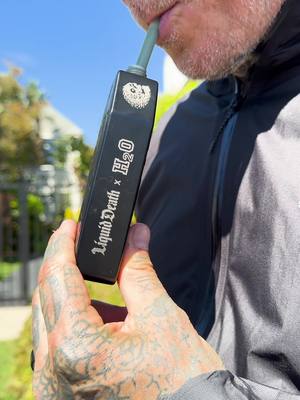 A post by @liquiddeath on TikTok caption: It's a flask. It's a casket. It's the H2O Flasket. Available for a limited time, link in bio. #liquiddeath #H2OGO