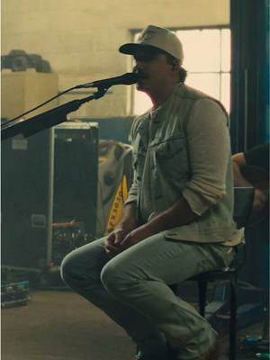 A post by @morganwallen on TikTok caption: Found a badass old auto shop and recorded some songs from the new album with my band. The first one, “Just In Case (The Shop Sessions),” is out now on YouTube.