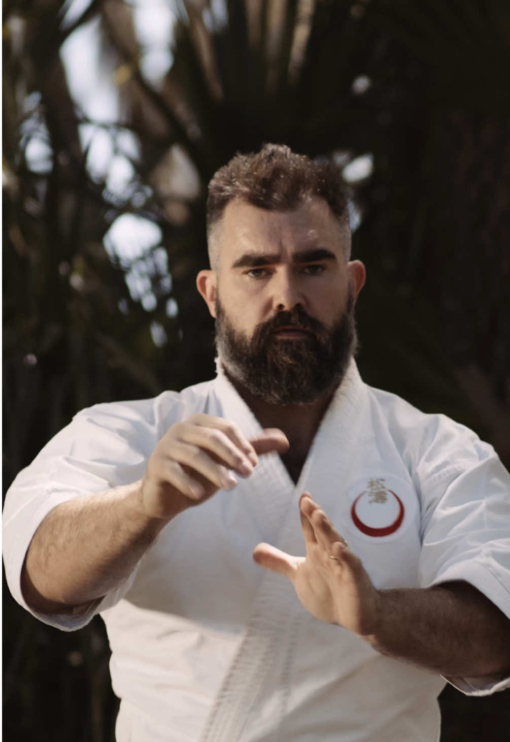 A post by @traviskelce on TikTok caption: Feeling some final boss energy 🥋  @drinkgaragebeer 