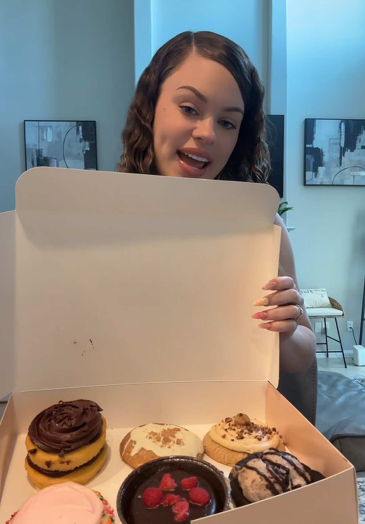 A post by @thereal.ceyana on TikTok caption: Trying the Kardashians x Crumbl cookies 