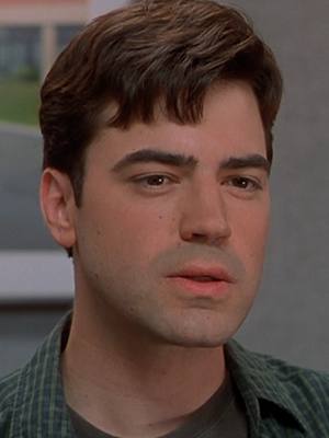 A post by @hulu on TikTok caption: Looks like the group chat has made it out of Slack. Now streaming: #OfficeSpace #RonLivingston