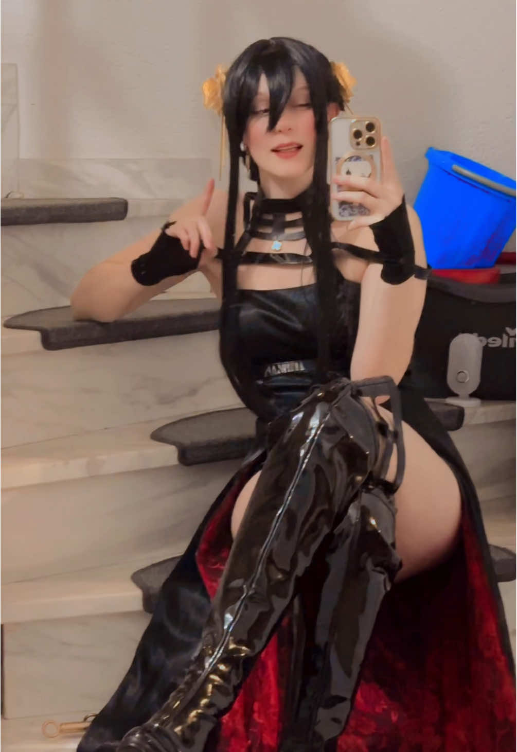 A post by @ on TikTok caption: I like you more…! 💕🌹 #yorforger #spyxfamily #spyxfamilyanime #spyxfamilycosplay #yorforgercosplay #nikkethegoddessofvictory #alicenikke #alicenikkecosplay 
