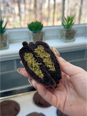 A post by @liviabenson on TikTok caption: dubai chocolate bar cookies 🌿🍫 #dubaichocolate #kanafeh #easyrecipes #spring #stuffedcookies #recipe #cookies #chocolate #dubaichoclatebar #easter #baking 