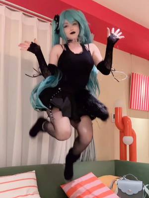 A post by @pinkchyu on TikTok caption: Goth Mikuuuuuuu 🩵 #miku #goth #gothic #Meme #mikucosplay #kawaii #Anime #latina #harajuku #harajukufashion 