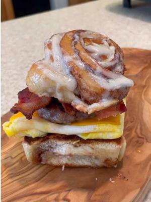 A post by @grubspot on TikTok caption: How do I send to myself🤨 #grubspot #cinnamonroll #egg #cheese #bacon #foodtiktok 