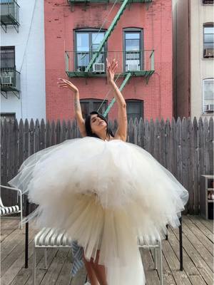 A post by @miakhalifa on TikTok caption: Cover of Autre styled by THEE Claire Sullivan (she made this dress🧚🏽‍♀️)