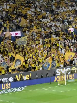 A post by @alkasstvsports on TikTok caption: 🎥 شوف | جماهير #النصر تشعل الأجواء بعد هدف التعادل 1-1 عن طريق #رونالدو في مرمى #الرياض #النصر_الرياض #قنوات_الكاس  #SPL #rsl  #دوري_روشن_السعودي  #الرياضة_على_التيك_توك 
