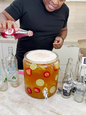 A post by @realtipsybartender on TikTok caption: Corona Sunrise Jungle Juice #cocktails #beer
